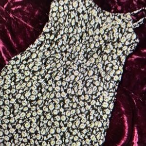 Features chic print ruffle dress